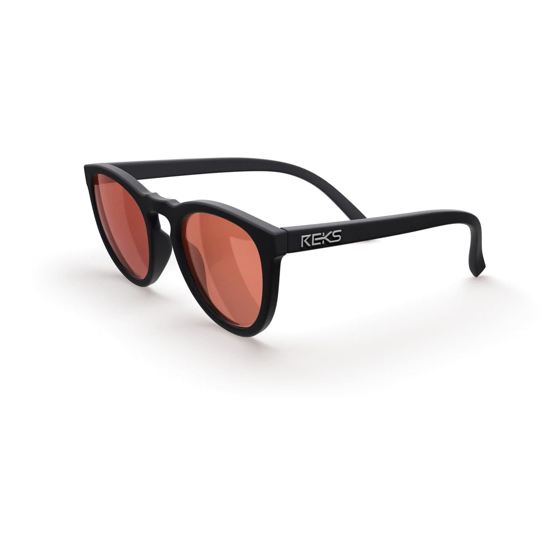 REKS® round polarized polycarbonate sunglasses with rose amber lenses, featuring a stylish round frame and UV protection.