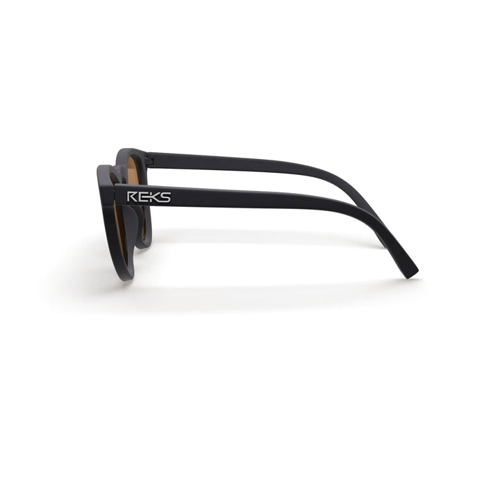 REKS® round polarized polycarbonate sunglasses with rose-amber lenses, featuring a stylish round frame and UV protection.