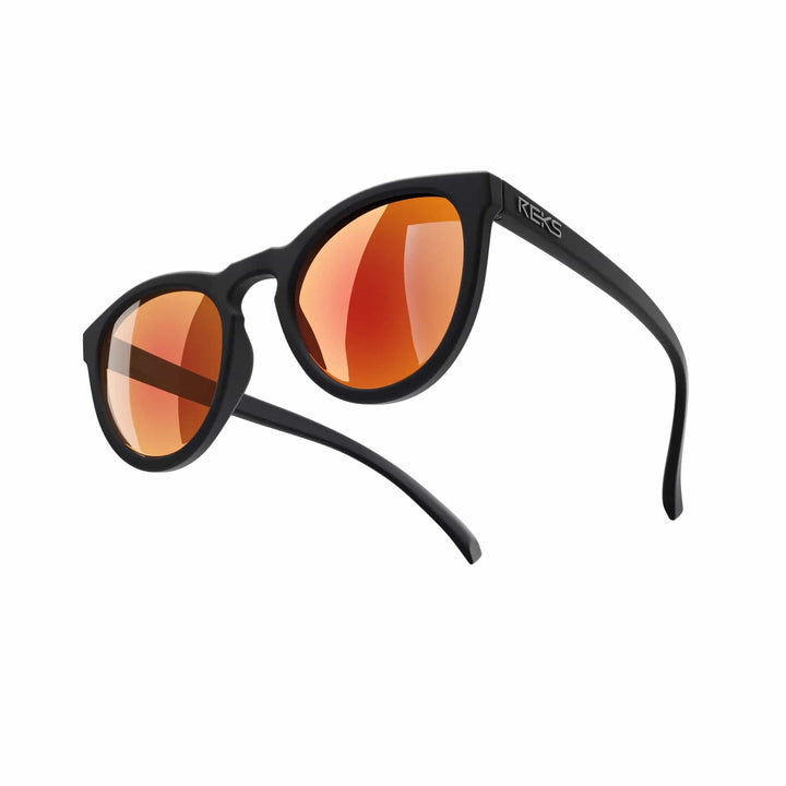 REKS® round polarized polycarbonate sunglasses with rose amber lenses, stylish and protective eyewear for outdoor wear.