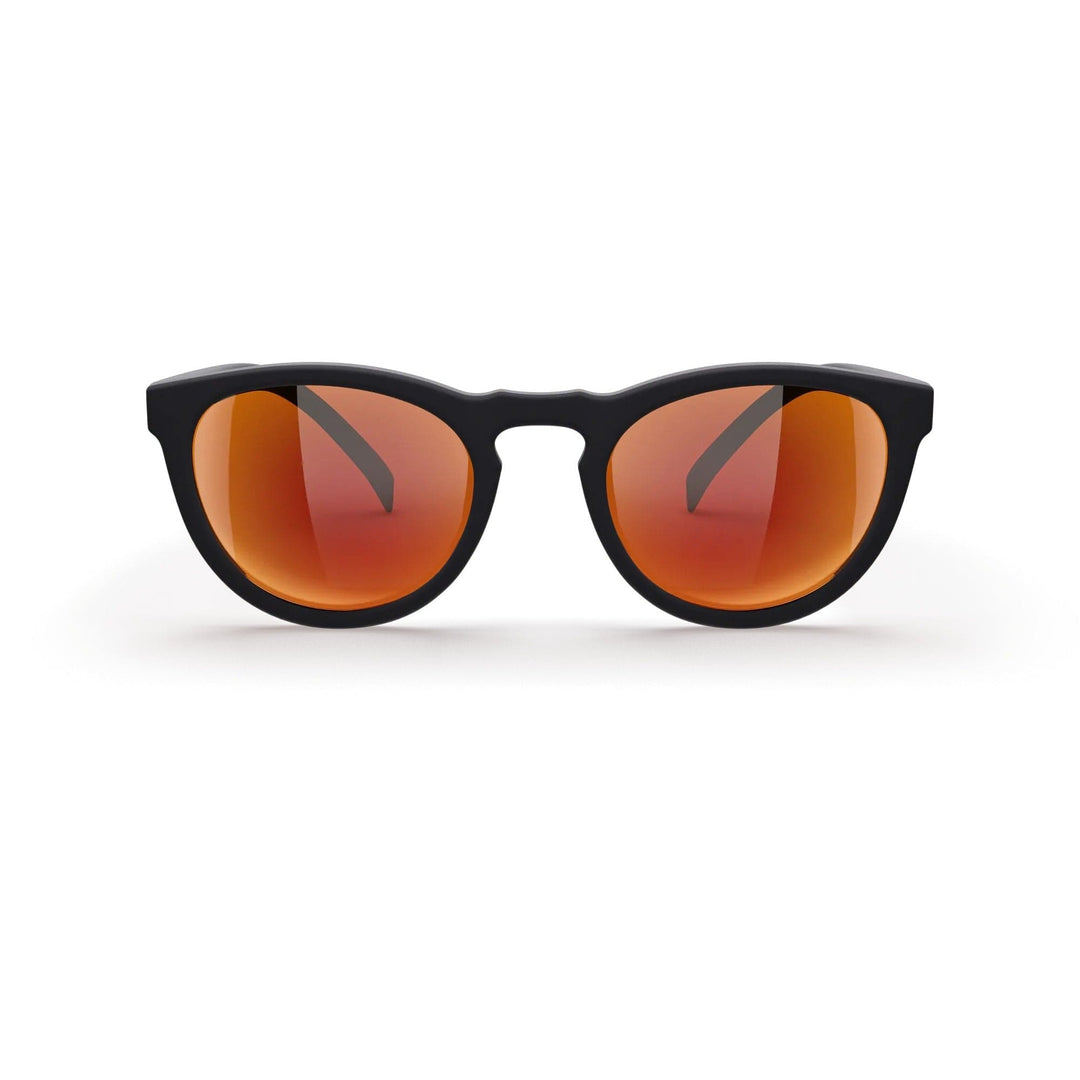 REKS® round polarized polycarbonate sunglasses with rose-amber lenses, stylish and protective eyewear for sunny days.