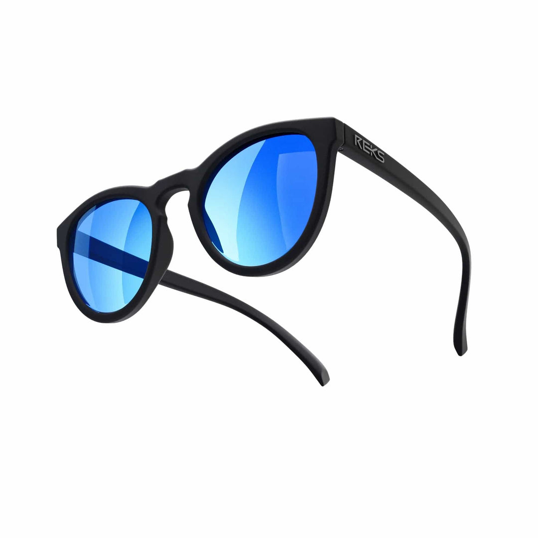 REKS® round polarized polycarbonate sunglasses with rose amber lenses, stylish and protective eyewear for sunny days.
