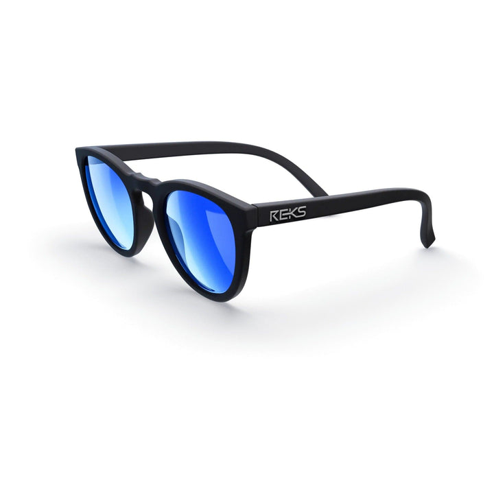 REKS® round polarized sunglasses with amber polycarbonate lenses and rose tint, featuring a stylish round frame.