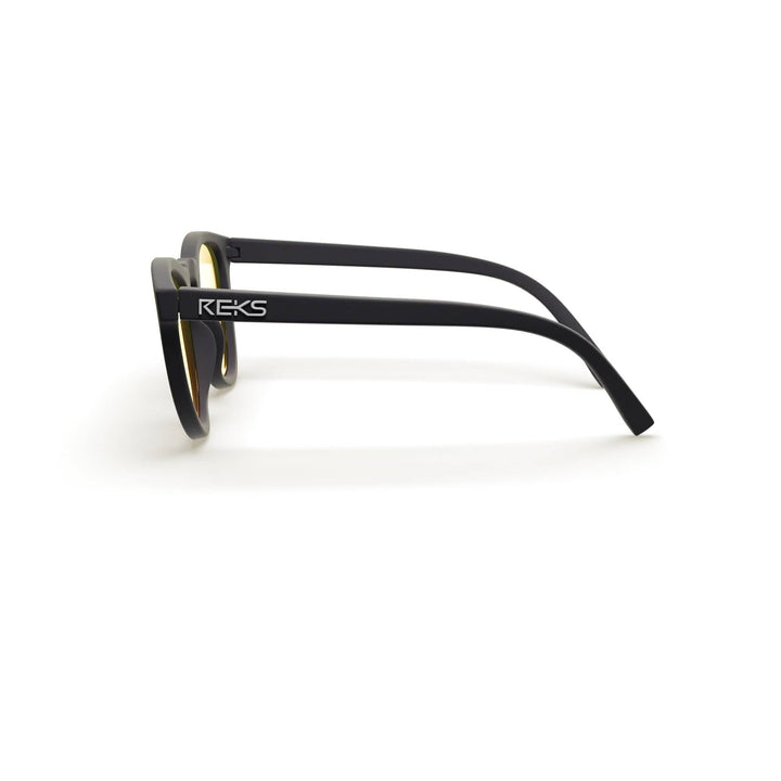 REKS® round polarized polycarbonate sunglasses with rose-amber tinted lenses, stylish and protective eyewear for outdoor use.