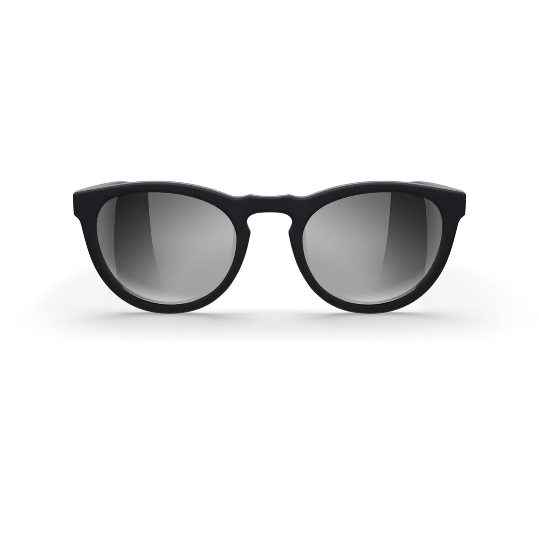 REKS® round polarized polycarbonate sunglasses with rose amber-tinted lenses, stylish and protective eyewear for sunny days.
