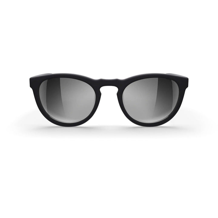 REKS® round polarized polycarbonate sunglasses with rose amber-tinted lenses, stylish and protective eyewear for sunny days.