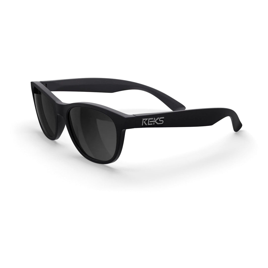 REKS Seafarer polarized prescription sunglasses with black polycarbonate frame and smoke tinted lenses, three-quarter view.