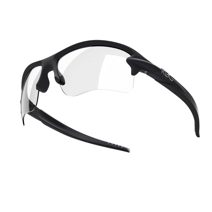 Black REKS® Sling Blade eyeglasses with sleek frame, featuring custom design and clear lenses, shown from different angles.