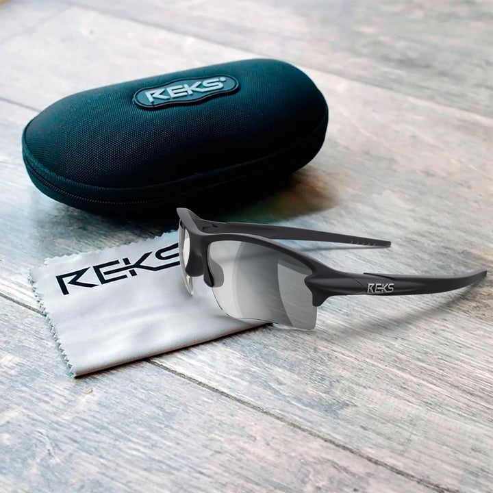 REKS® Sling Blade Polarized Trivex® sunglasses with sleek silver frame and dark lenses, showcasing stylish eye protection.