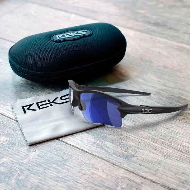 REKS® Sling Blade polarized sunglasses with Trivex® lenses, blue frame, showcasing sleek design and polarized lens detail