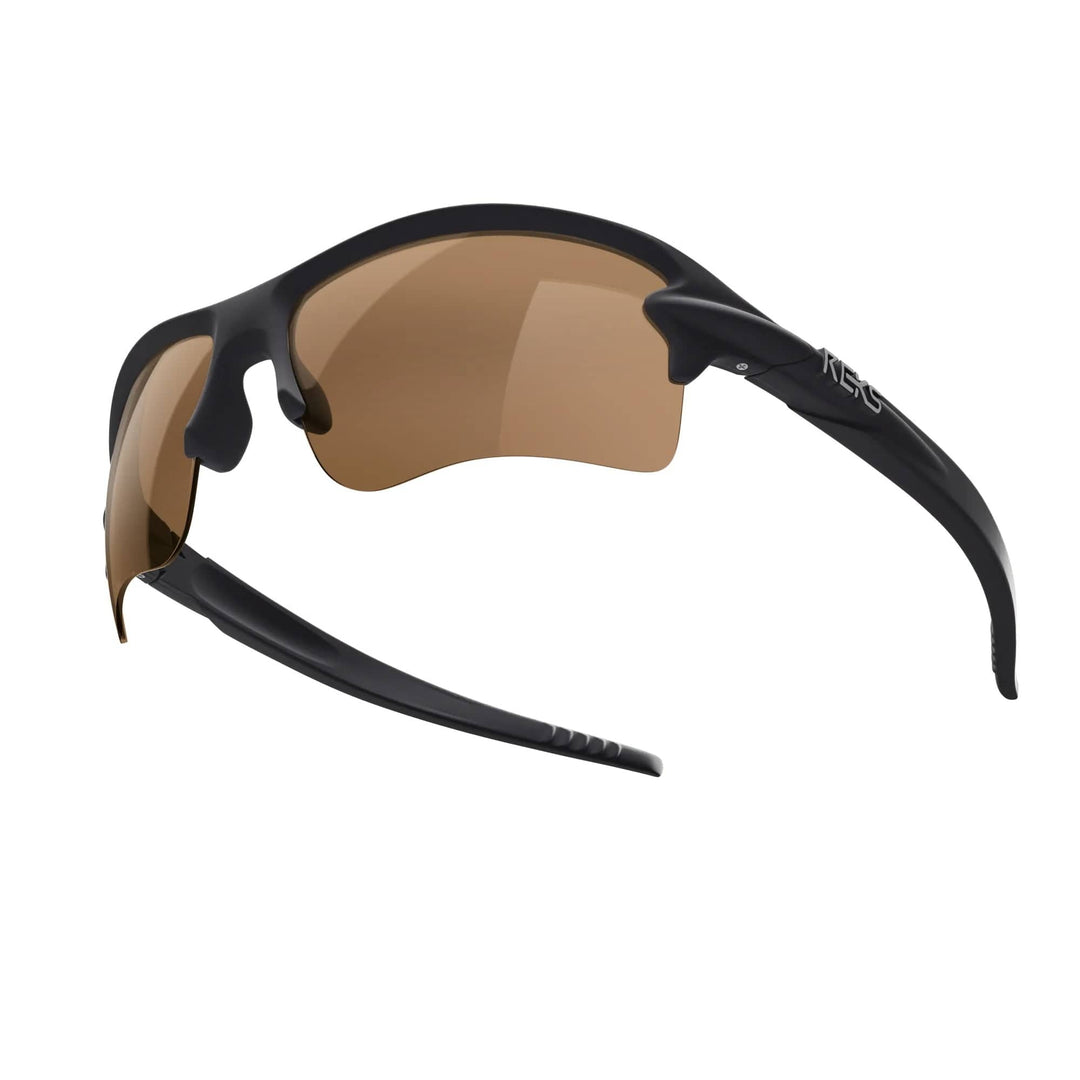 REKS SlingBlade polarized sunglasses in black with brown tinted lenses, showcasing the sleek sling-blade design and custom frame detail.