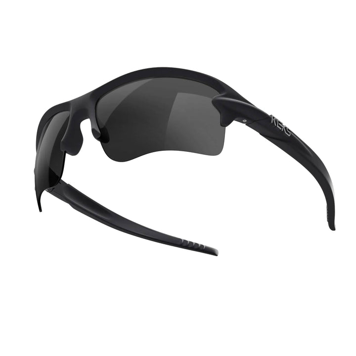 REKS Sling Blade polarized sunglasses in black with smoke tint lenses, showcasing a sleek, modern design with Trivex® lenses.