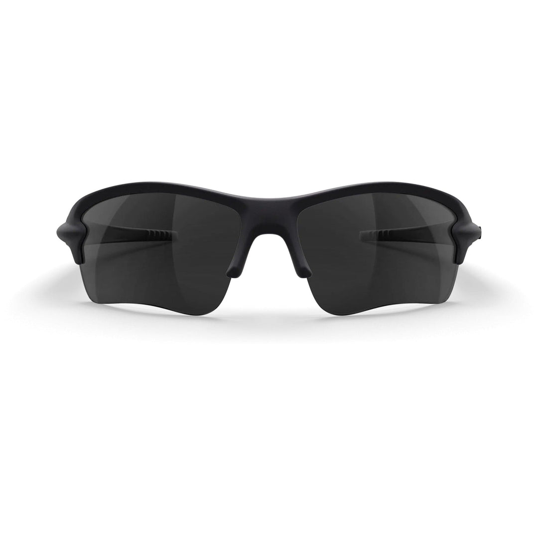 REKS SlingBlade polarized sunglasses with smoke tinted lenses, black frame, front view showcasing sleek design and lightweight construction.