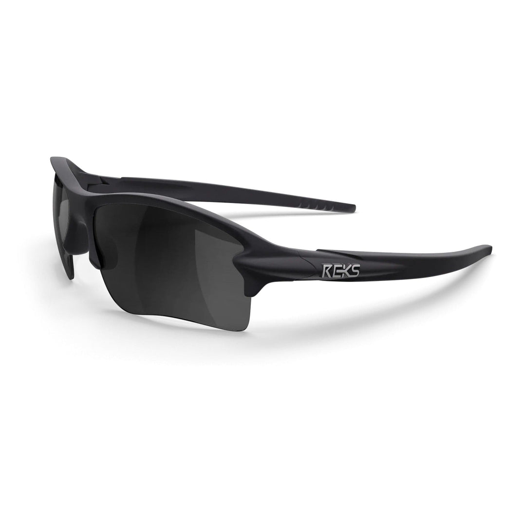 REKS® Sling Blade Polarized Trivex sunglasses in black with smoke-tinted lenses, three-quarters view showing sleek design