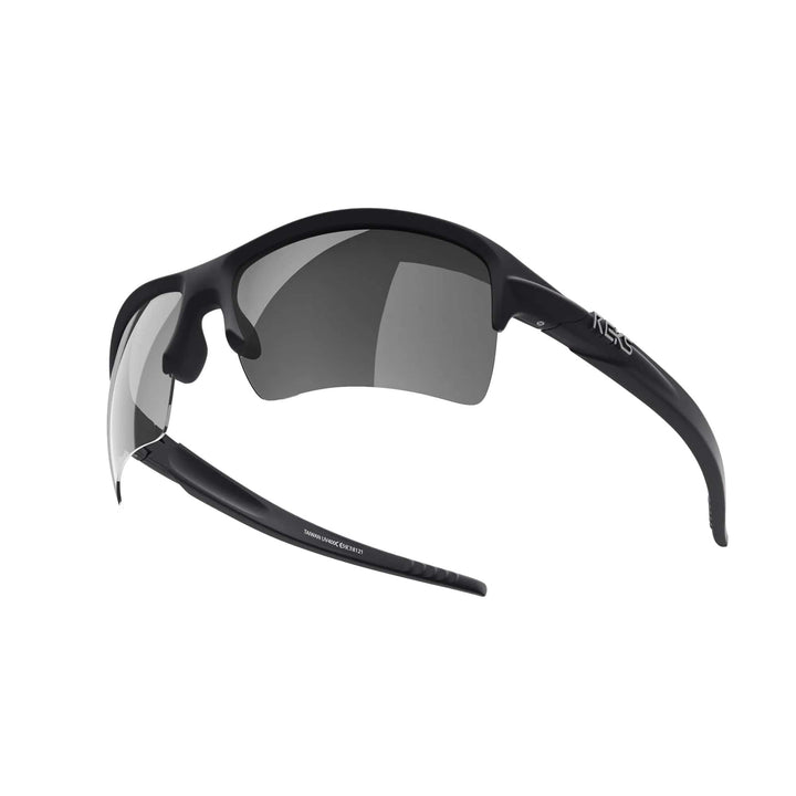 REKS Sling XM polarized sunglasses with black frame and silver mirror lenses, featuring Trivex® lens for durability and clarity.