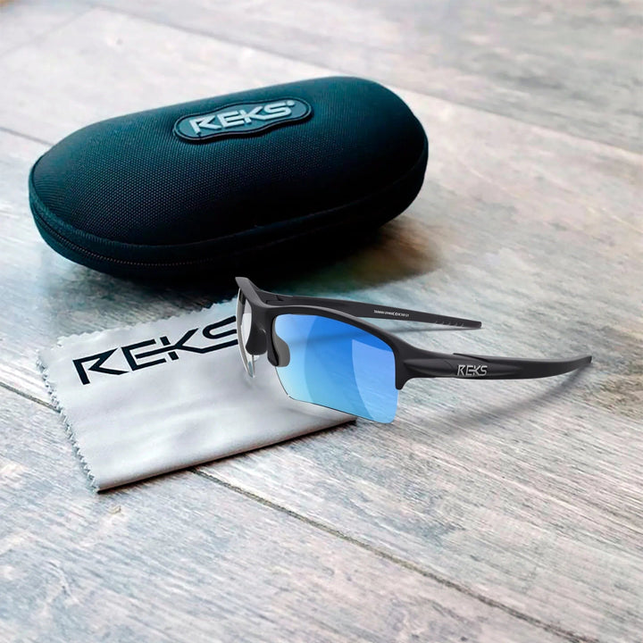 REKS Sling XM polarized sunglasses with Trivex® lenses, featuring a sleek black frame and adjustable nose pads.