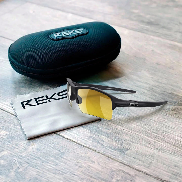 REKS Sling XM polarized sunglasses with Trivex lenses, black frame, and adjustable nose pads, shown in a close-up image.