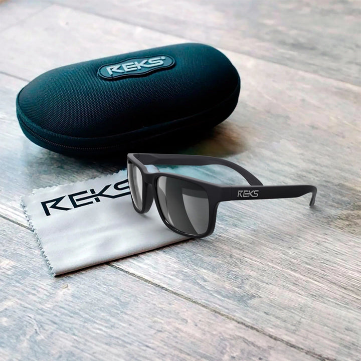 Reks® sport polarized sunglasses with Trivex lenses in a black case, designed for active outdoor use.