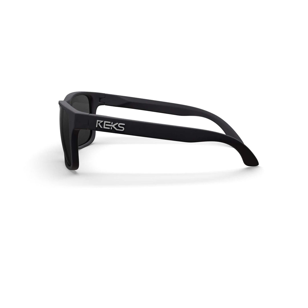 REKS® Sport polarized sunglasses with black tinted smoke lenses, side view showing durable Trivex® frame and sporty design.