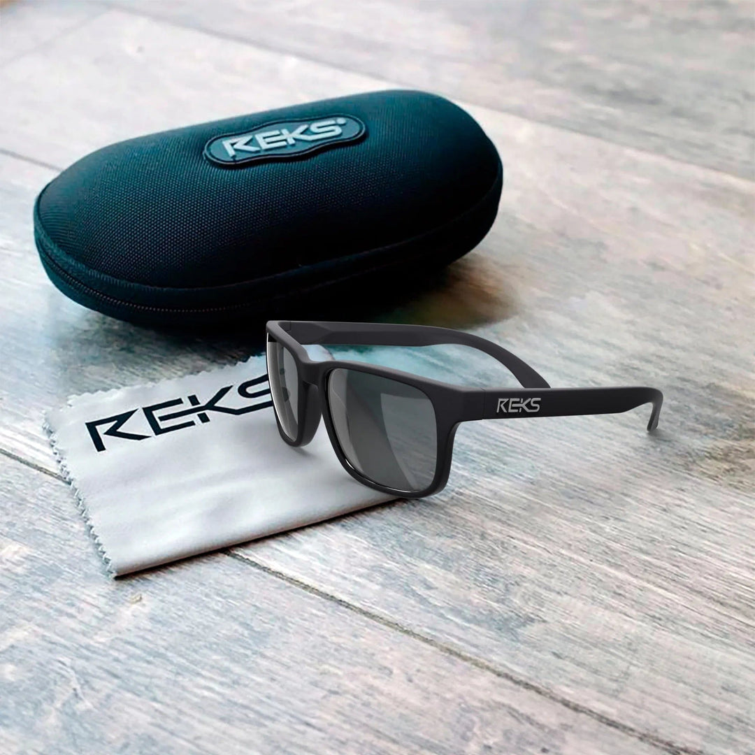 REKS® sport polarized polycarbonate prescription sunglasses with case, featuring sleek design and UV protection.