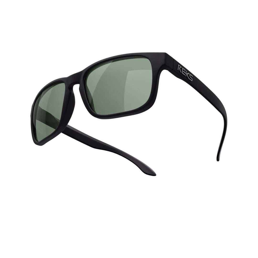 REKS® sport polarized prescription sunglasses with black frames and green-tinted polycarbonate lenses, designed for active wear.