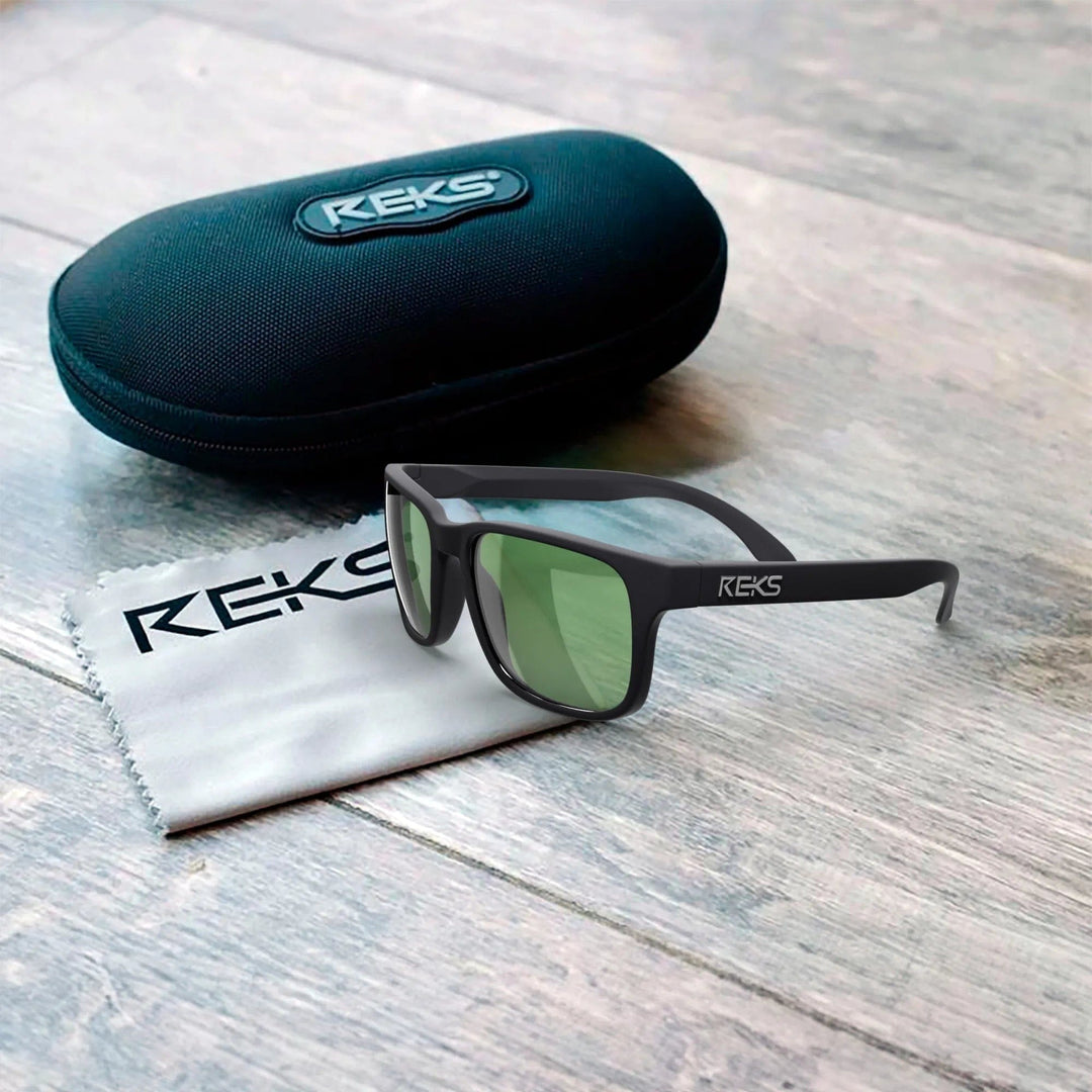REKS® sport polarized polycarbonate prescription sunglasses with sleek frame, shown in protective case.