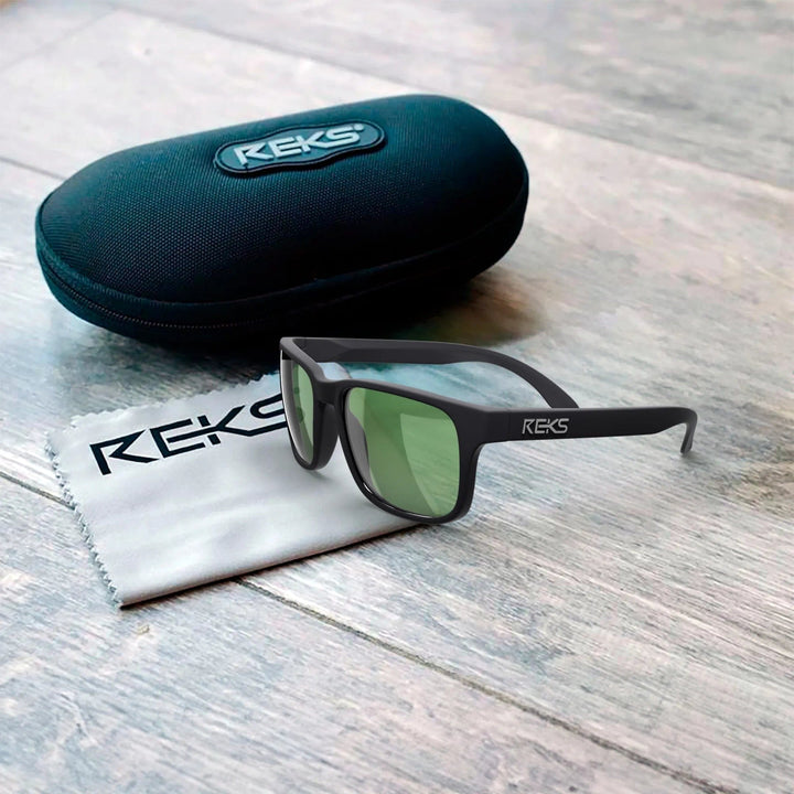 REKS® sport polarized polycarbonate prescription sunglasses with sleek frame, shown in protective case.