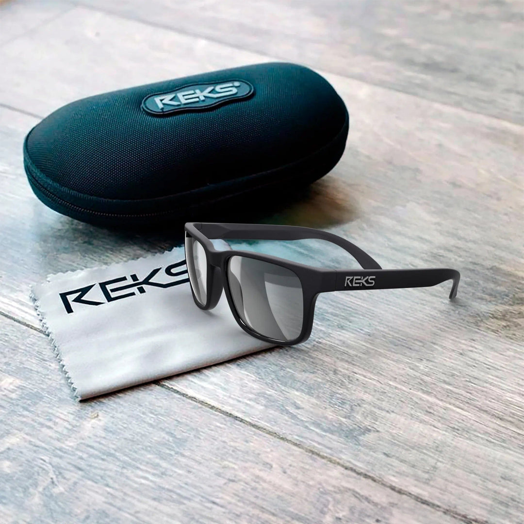 REKS® sport polarized polycarbonate prescription sunglasses with sleek case, designed for outdoor activities and UV protection.