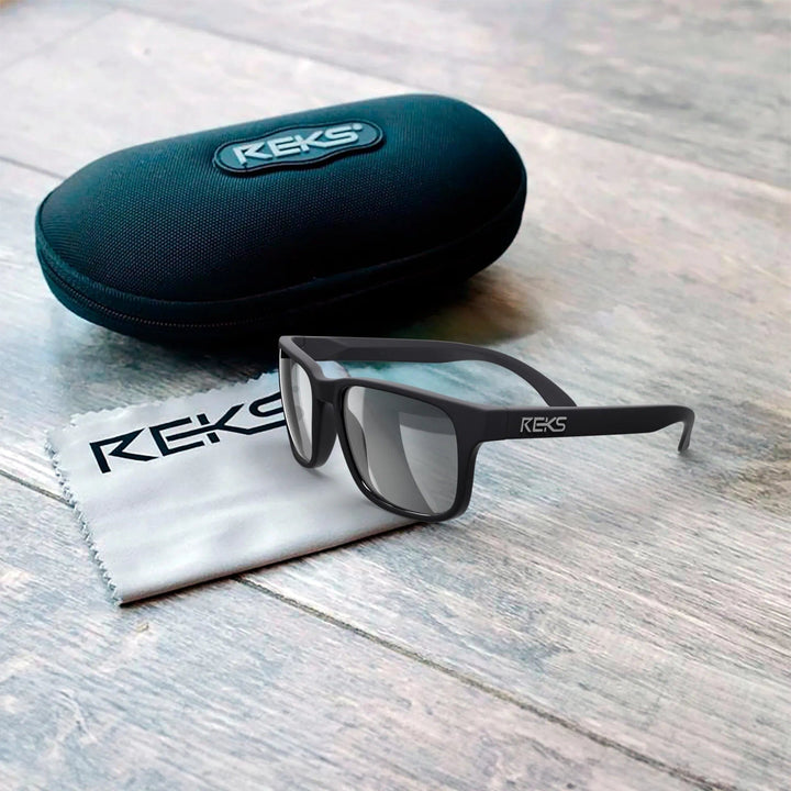 REKS® sport polarized polycarbonate prescription sunglasses with sleek case, designed for outdoor activities and UV protection.