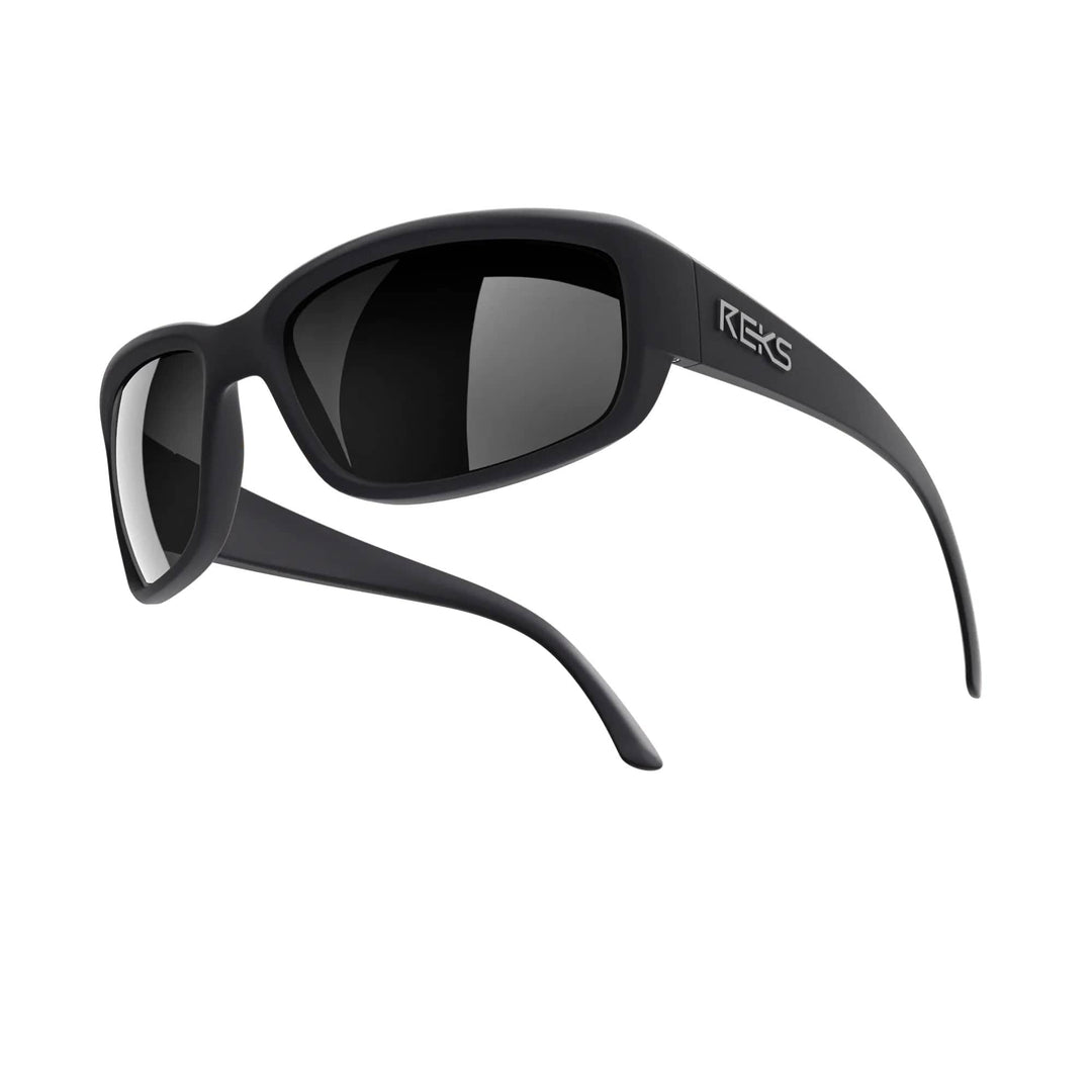 Black REKS® wrap-around polycarbonate sunglasses with mirrored lenses, featuring a sleek, curved design for full eye coverage.