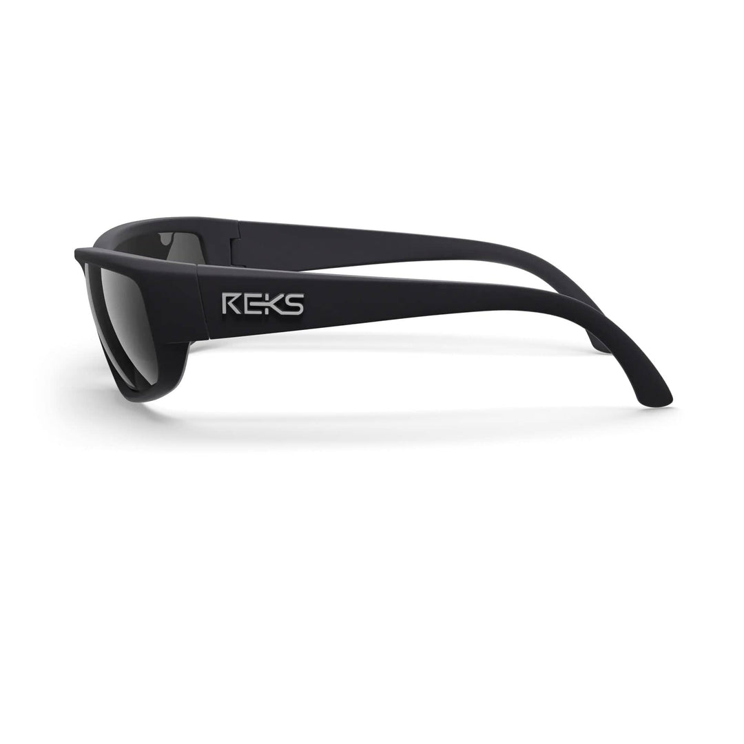 REKS® wrap around polycarbonate sunglasses with black frames and mirrored lenses, shown from the side angle.