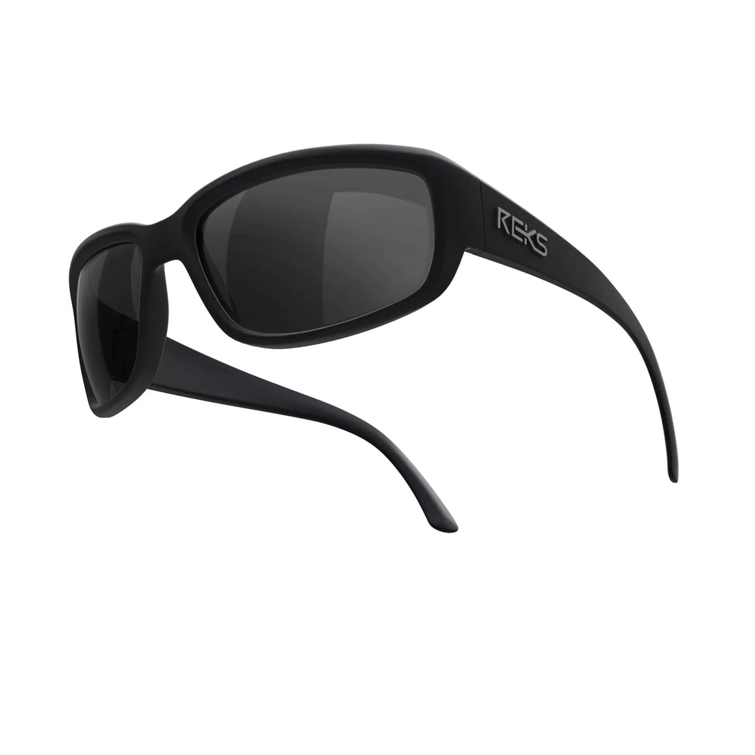 REKS® large wrap-around polarized sunglasses with black tinted smoke polycarbonate lenses, offering full eye coverage and UV protection.