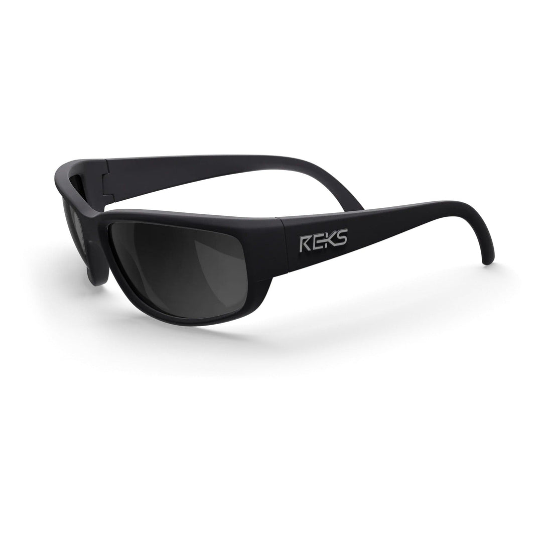 Large wrap-around REKS® polarized sunglasses with black tinted polycarbonate lenses, shown in a three-quarters view.