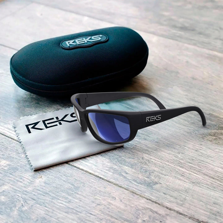 Large REKS® wrap polarized polycarbonate sunglasses in a blue case with sleek, modern design and sturdy build.