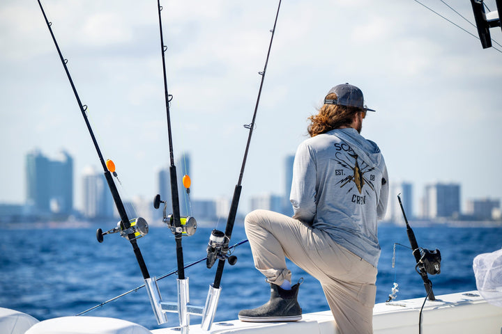 Blue gold hooded long sleeve active performance shirt by Scalesgear.com, featuring lightweight fabric and sporty fit.