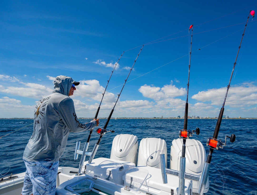 Blue gold hooded active performance long sleeve shirt from Scalesgear.com, shown on a mannequin.