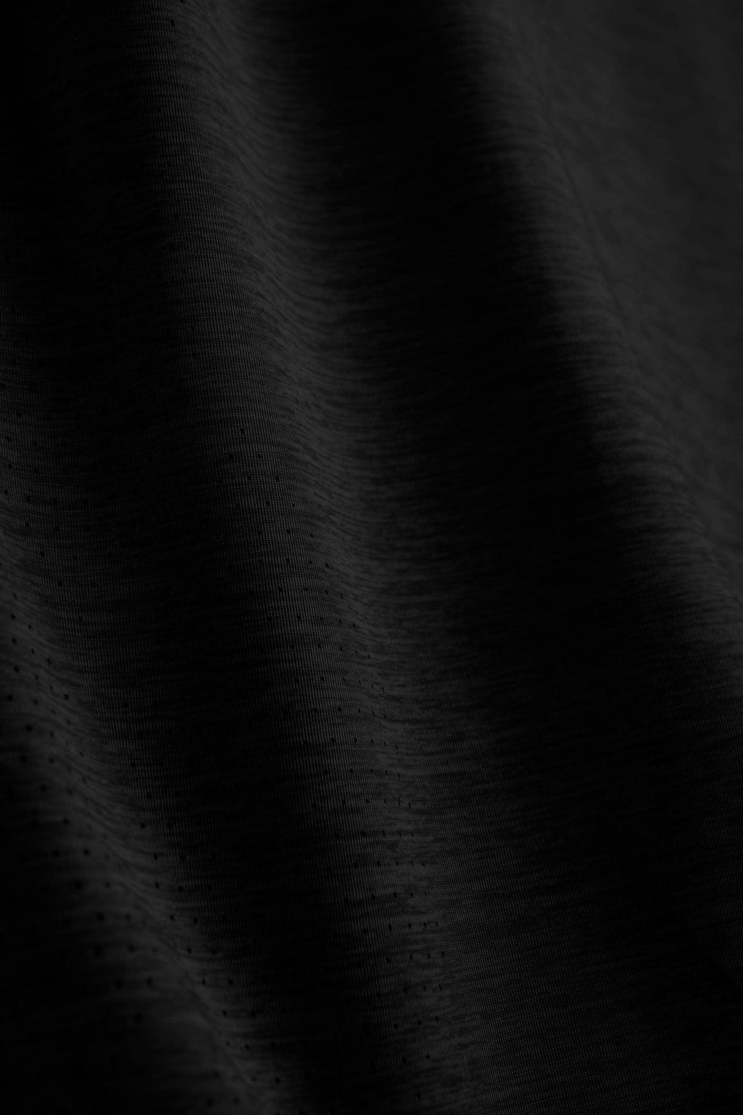 Black Heather long sleeve active performance shirt by Scalesgear.com, featuring a sleek design and comfortable fit for active wear.