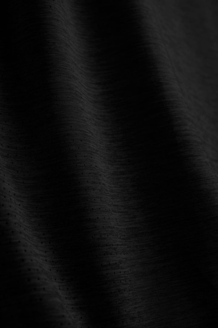 Black Heather long sleeve active performance shirt by Scalesgear.com, featuring a sleek design and comfortable fit for active wear.