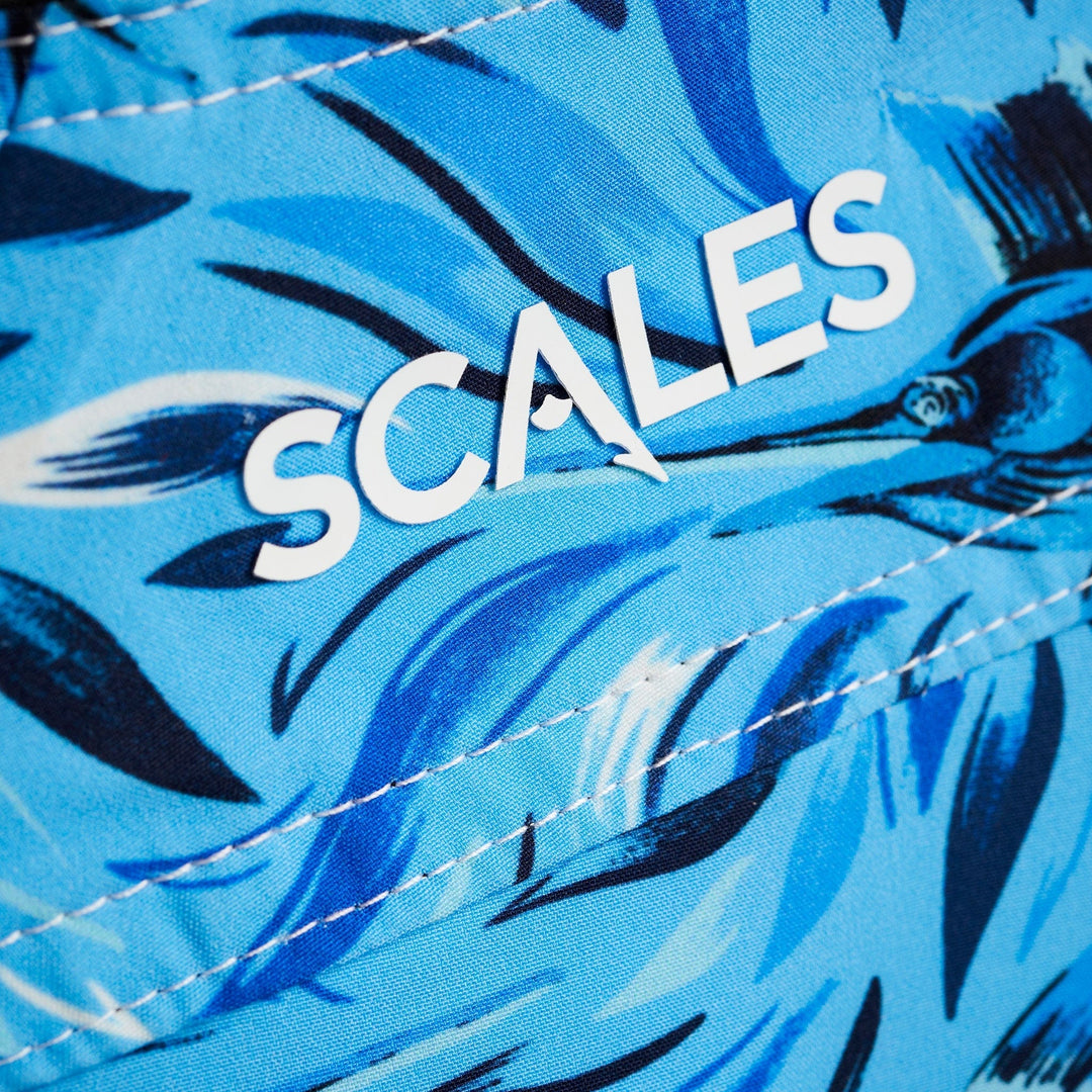 Powder blue Flower Strike First Mates boardshorts by Scalesgear.com, featuring floral pattern, elastic waistband, and quick-dry fabric.