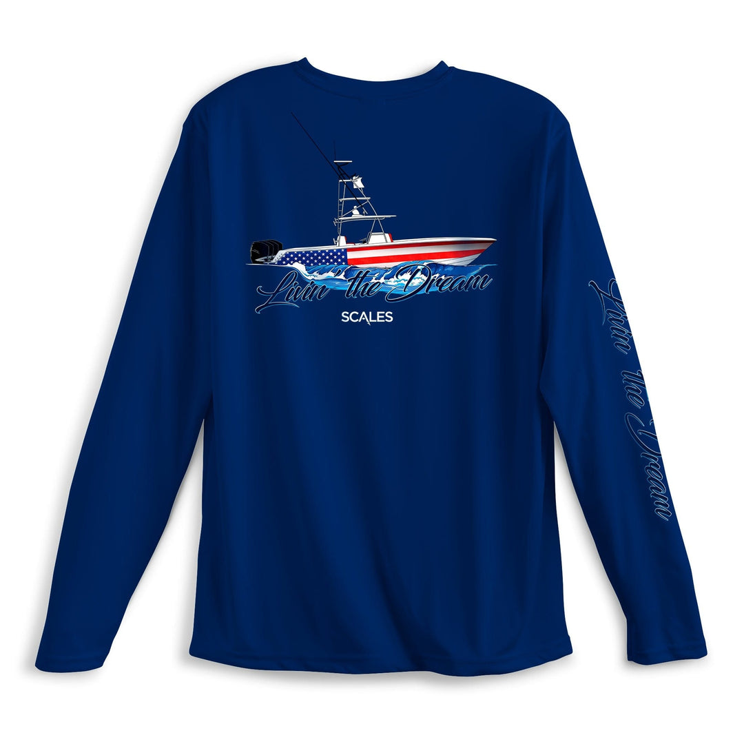 Marine blue long sleeve performance tee by Scalesgear.com from the Living The Dream LS Performance collection, shown on a hanger.