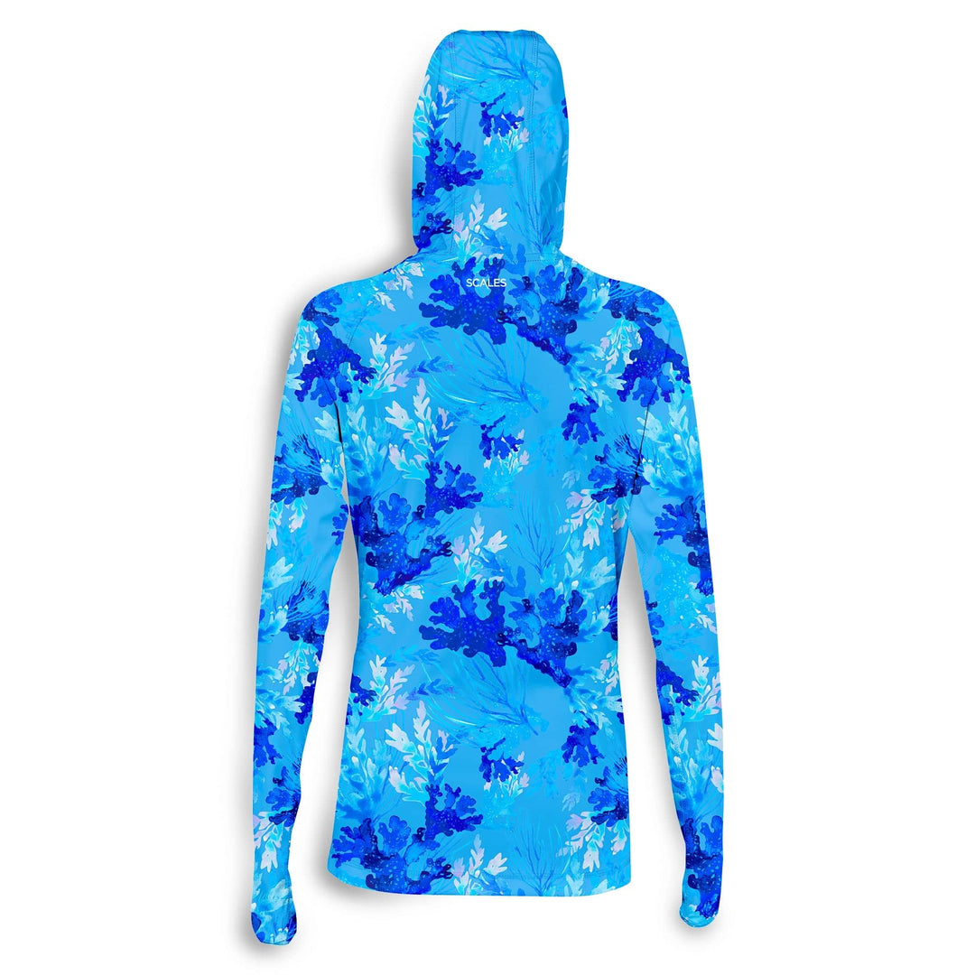 Light blue women's Coral Tropics performance hooded long sleeve shirt by Scalesgear.com, featuring a comfortable hood and long sleeves.