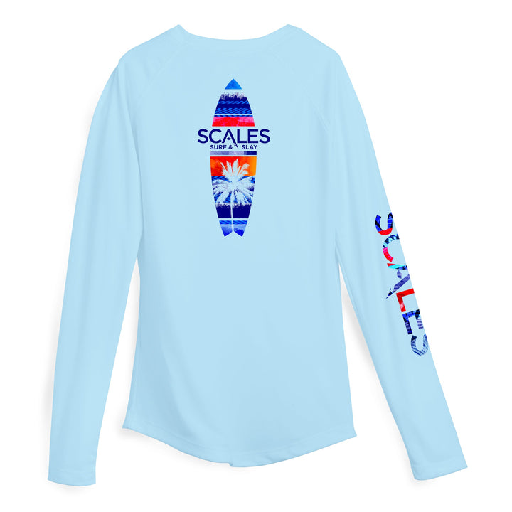 Light blue women's performance long sleeve shirt by Scalesgear, featuring breathable fabric and a fitted athletic design.