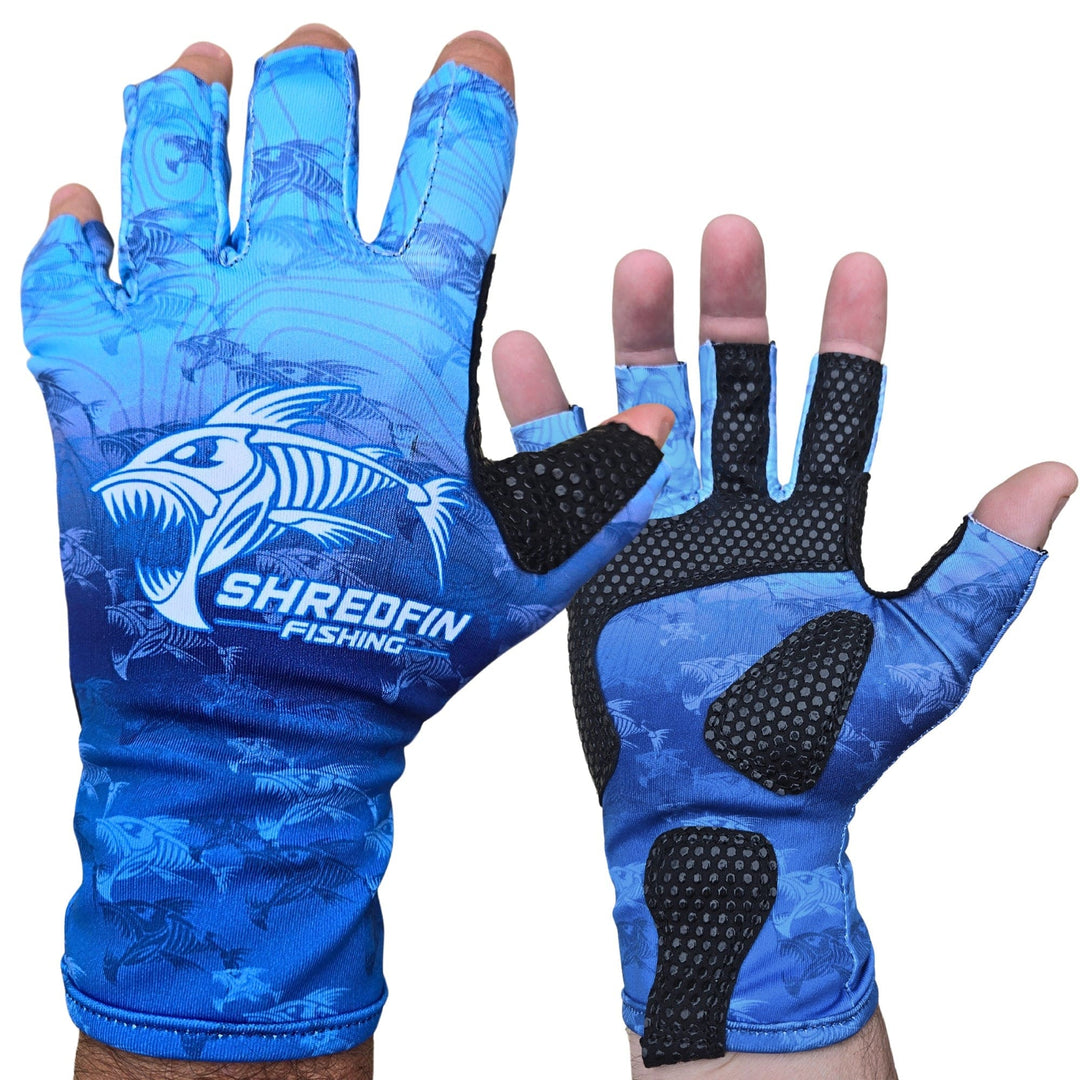 Blue ShredFin Fingerless Fishing Gloves shown in a close-up, highlighting the lightweight, breathable fabric and grip-enhanced palms.