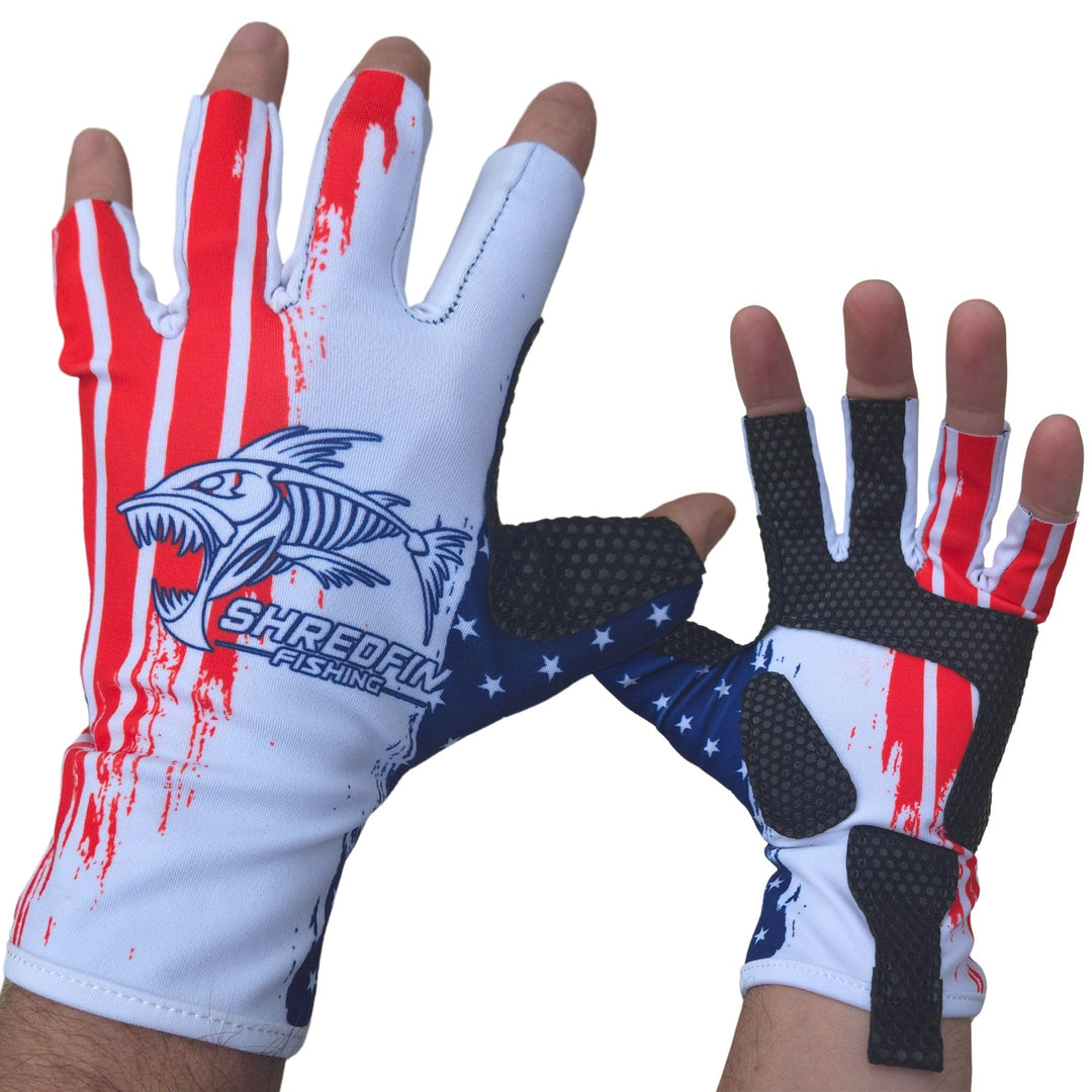 ShredFin Fingerless Fishing Gloves in red, white, and blue, offering grip and flexibility for outdoor fishing activities.