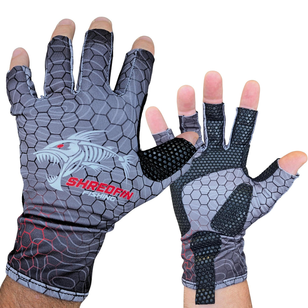 ShredFin fingerless fishing gloves with hexcast pattern in tungsten gray and red, designed for fishing and outdoor activities.