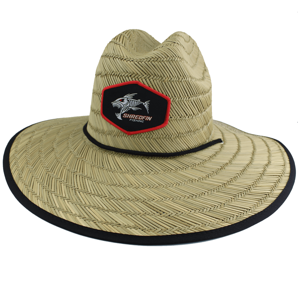 ShredFin El Lago straw hat with wide brim and woven texture, perfect for sun protection and casual summer style.