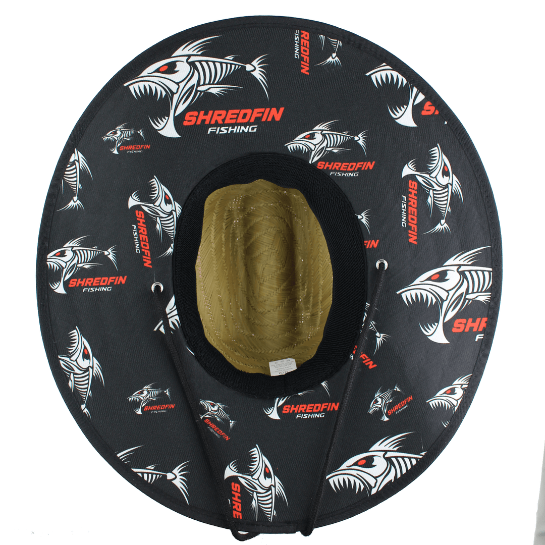 ShredFin El Lago straw hat showing the underside with woven straw pattern and wide brim for sun protection.