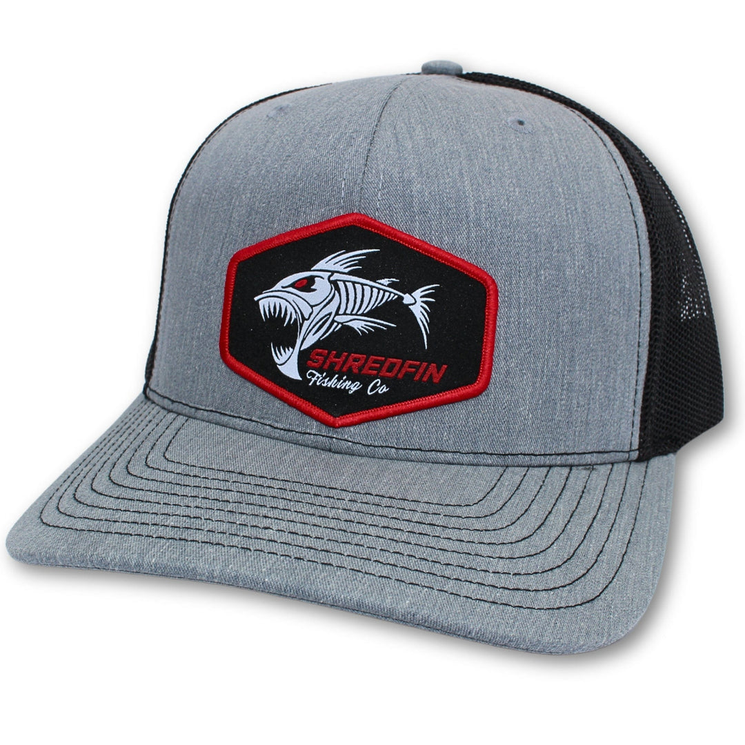 ShredFin Heather Gray and Black patch hat featuring a curved brim and adjustable strap for a casual, sporty look
