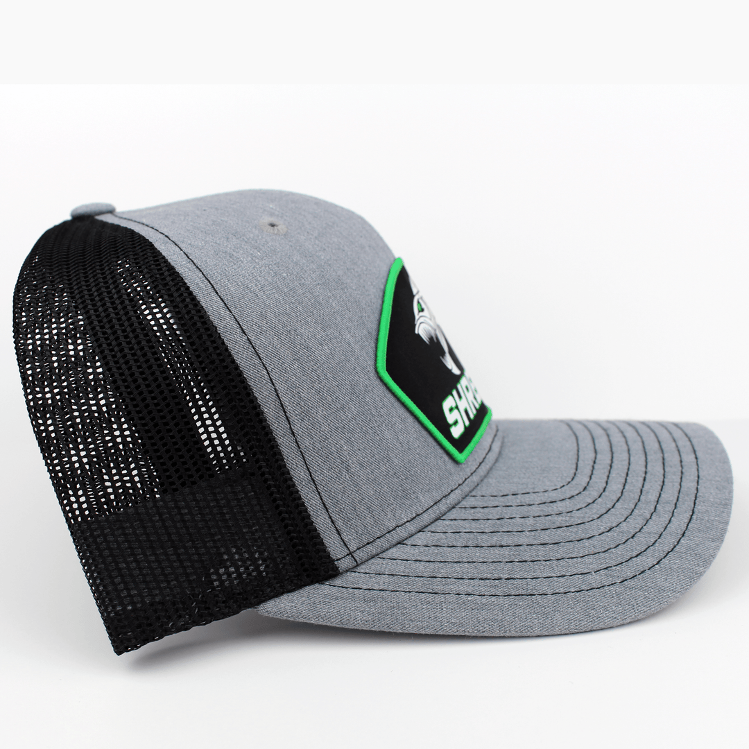 ShredFin Heather gray and black patch hat with neon green border, showing side view of stylish casual hat.
