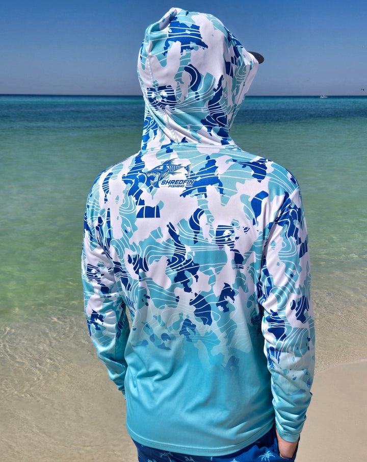 ShredFin Contourz Camo Hooded Performance Shirt in seafoam fade, featuring a camo pattern and hood for active wear.