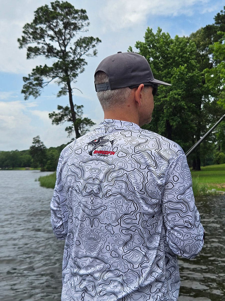 ShredFin Contourz Performance Shirt in white and black, fitted athletic shirt with sleek design and breathable fabric.